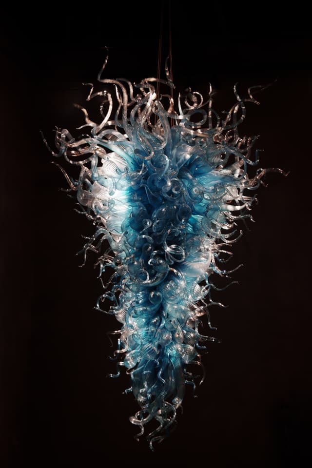 glass sculpture, glass tendrils, internal light, inverted cone, suspension cables